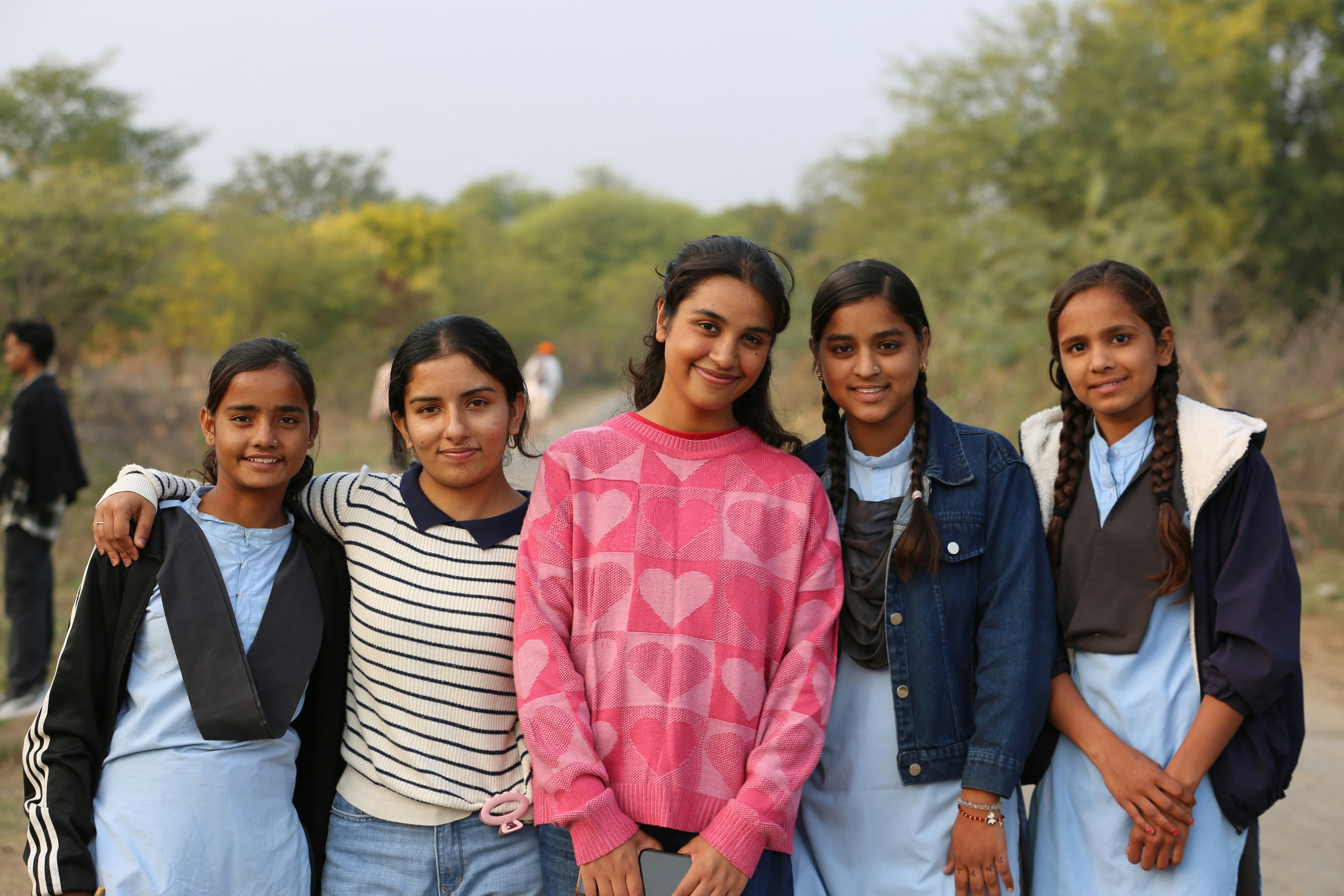 Scholarship students celebrating education milestones
